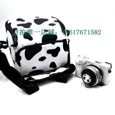 相機包 奶牛可愛相機包適合拍立得富士尼康佳能200DM50M200R10ZVE10