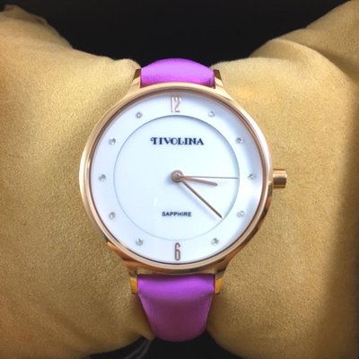 日本 TIVOLINA 高帽子 金色圓形 簡約美觀 女錶 LAS3755WP 桃色錶帶