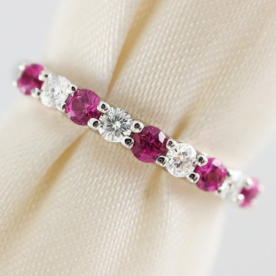 Tiffany PT950 爪鑲白金粉紅寶+鑽石線戒,專櫃價14萬元