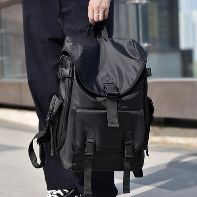 時尚男生後背包大容量簡約輕便出行書包潮流防水筆電包