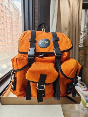 GUCCI全新真品義大利製滿版雙G LOGO再生尼龍製橘色後背包(626160)---4.4折出清(不議價商品)