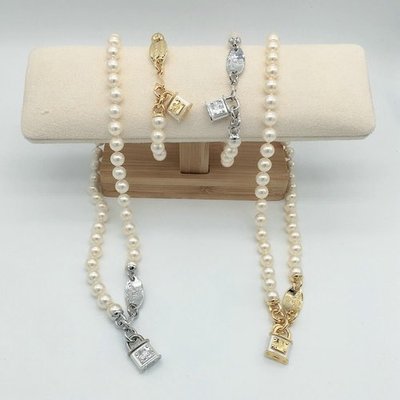 現貨熱銷-Vivienne Westwood 金色銀色樹脂鎖頭配淺粉珍珠項鏈 土星手鏈