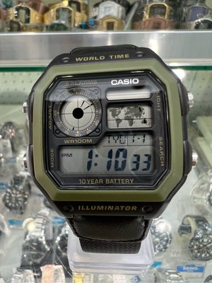 【金台鐘錶】CASIO卡西歐 (世界地圖顯示) 世界時間地點 LED照明 (黑帆布錶帶) AE-1200WHB-1B