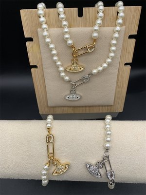 現貨熱銷-Vivienne Westwood 金銀色滿鉆別針土星打結珍珠鏈條項鏈 手鏈