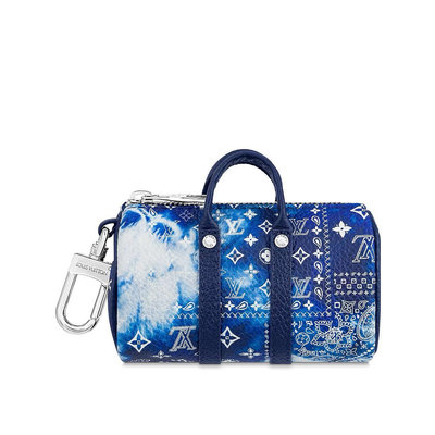 Shop Louis Vuitton Speedy monogram bag charm (M00544, M00995