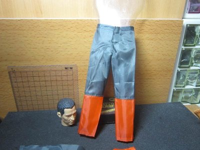 RJ3休閒部門 1/6黑橘雙色風衣型運動長褲一件