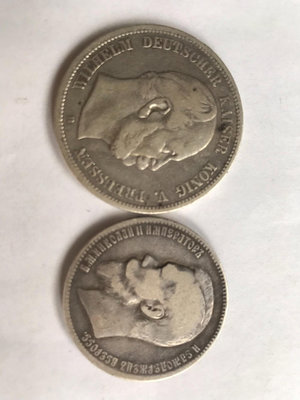 左邊德國威廉一世1876年B版5馬克銀幣
