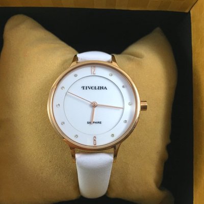 日本 TIVOLINA 高帽子 金色圓形 簡約美觀 女錶 LAS3755WW 白色錶帶