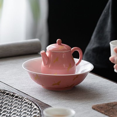 熱銷 桃紅釉仙鶴茶壺家用陶瓷泡茶單小壺帶過濾球孔日式功夫茶具沖茶器 可開發票
