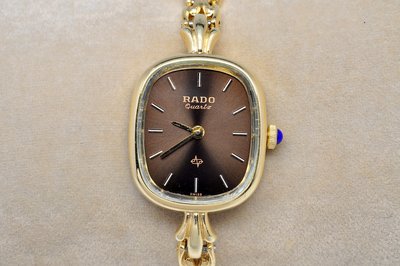 《寶萊精品》RADO 雷達金咖啡色手環式石英女子錶