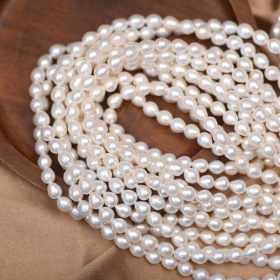珍珠表面光滑水滴米形珍珠散珠6mm天然淡水珍珠DIY串珠材料飾品配件
