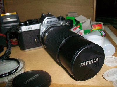Nikon FM2 單眼相機.閃光燈.鏡片.底片.背包一組