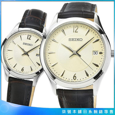 【柒號本舖】SEIKO精工藍寶石石英皮帶對錶-香檳銀 / SUR421P1 SUR427P1