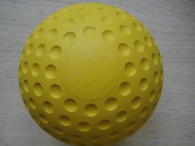 **黃色凹洞棒球/洞洞球硬式橡膠棒球發球機用一顆60元