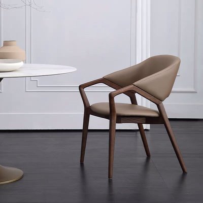 廠家現貨直發意大利皮藝簡約設計師實木餐椅北歐現代家用扶手ico chair 洽談椅