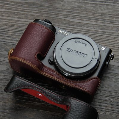 適用索尼zve10相機套 半套底座 真皮手柄 ZV-E10機身保護套相機包