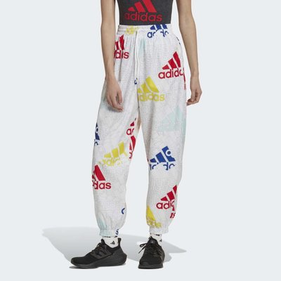 Adidas ESSENTIALS MULTI-COLORED LOGO LOOSE FIT WOVEN PANTS