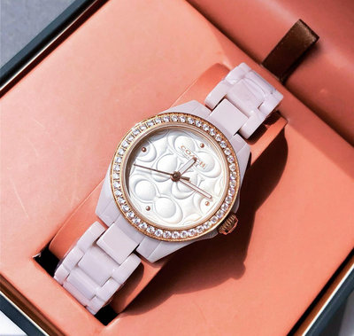 COACH Astor 水鑽圈 C字浮雕錶盤 粉色陶瓷錶帶 石英 女士手錶 14503256