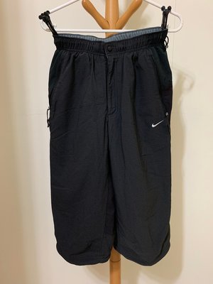 衣市藍~NIKE DRI-FIT 壓釦式運動七分褲 (S~165/72A~格紋黑~) (210715)