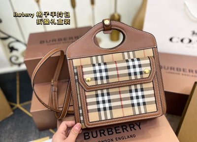 【二手包包】巴寶莉 Burberry的托特包很好看，特別的樣式，而且中間有一個束口的皮革條帶，飾帶靈感源自品 N.O72548