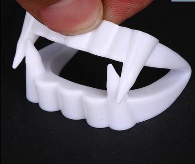 Fake plastic vampire teeth for Halloween Dracula bat zoombie