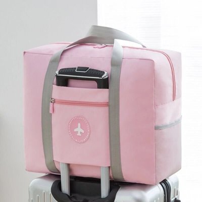 熱銷 旅行包女手提袋大容量行李包防水收納袋旅行必備登機包可套拉桿箱簡約