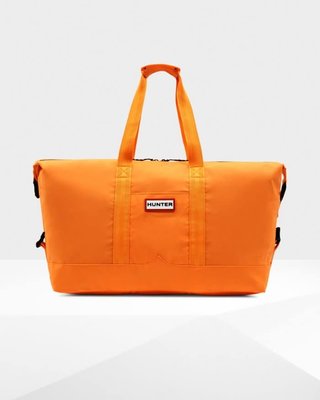 《 漢娜小姐 》❤️ HUNTER 輕量級 防水橡膠材質 萬用旅行袋 (亮橘)