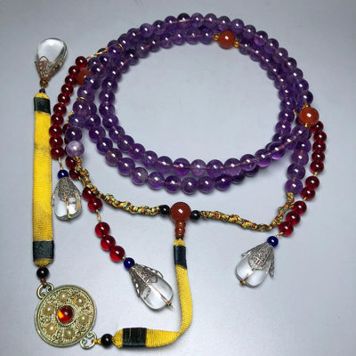 藏區回流天然紫水晶朝珠尺寸：10mm108顆朝珠周長大致在130至170厘米之間，主體由108顆珠子組成，意 ZK13651
