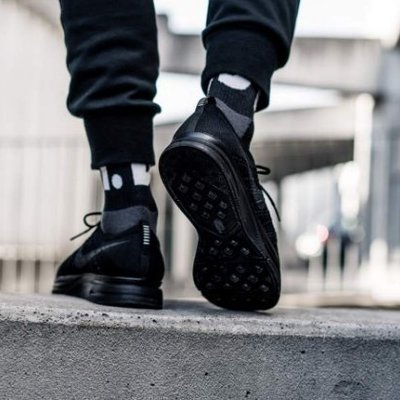 Flyknit trainer triple black hotsell on feet