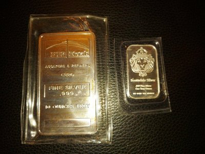 純銀999 美國NTR-10盎司銀條(國際知名品牌)+美國SCOTTSDALE獅王銀條1盎司；共2件一起售（如照片所示）