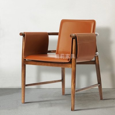 馬鞍皮家用設計師休閑椅子北歐實木餐椅現代簡約單人扶手椅洽談椅