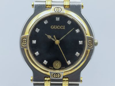 【發條盒子H0084】GUCCI 古馳 黑鑽面 石英日期顯示 不銹鋼/鍍金 半金練帶女錶款 9000M