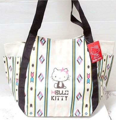 天使熊小鋪~日本帶回Hello Kitty貓手提包 凱蒂貓旅行包 帆布包 彩繪行李袋 原價1350