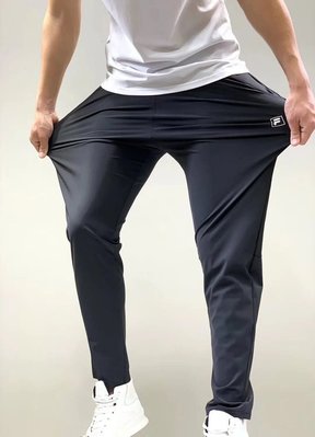 【熱賣精選】呱啦呱FlLA斐樂 男款褲子 2020 3M反光Logo 九分男士冰絲梭織休閒褲  彈力休閒速干褲
