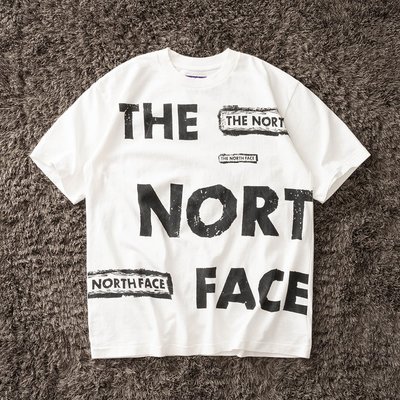 【MOMO全球購】THE NORTH FACE 5.5oz H/S Graphic 紫標版畫短袖T恤
