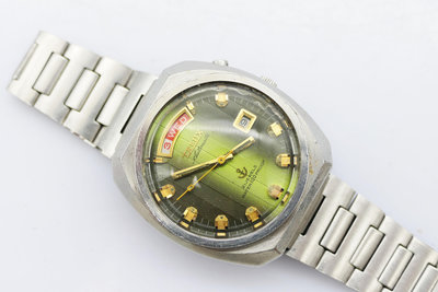 (小蔡二手挖寶網) TELUX 鐵力士 自動機械錶 綠表面 日星期顯示 原廠錶帶 有行走 商品如圖 1元起標 無底價